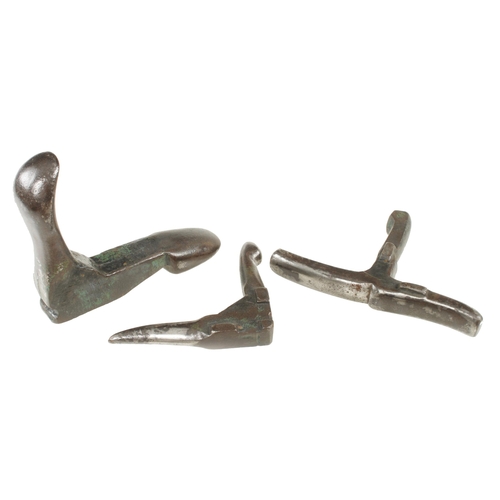 510 - Three multi-faced coppersmith's vice stakes G