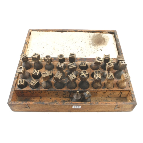 649 - A set of brass letter stamps with wood handles in pine box G+