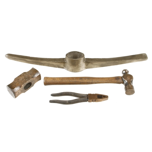 786 - Four miner's brass or bronze tools i.e. pick axe, pliers and two hammers G+