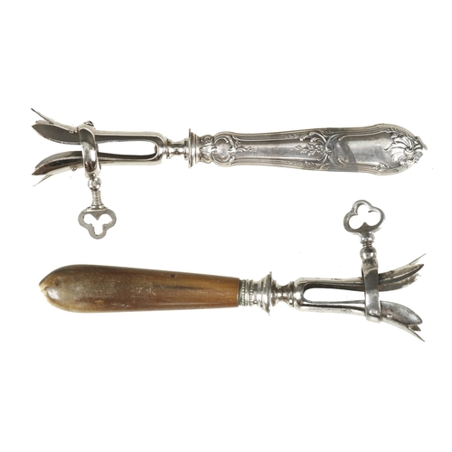 797 - Two early hambone clamps with horn and silvered handles G++