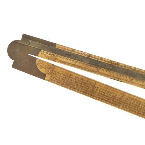 860 - A 2' two fold boxwood and brass Engineer's Cotton Spinner's slide rule by THOMAS BRADBURN Birm'm and... 