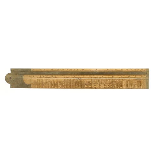 867 - A 2' two fold boxwood and brass engineer's slide rule by RABONE designed by I Routledge Engineer als... 