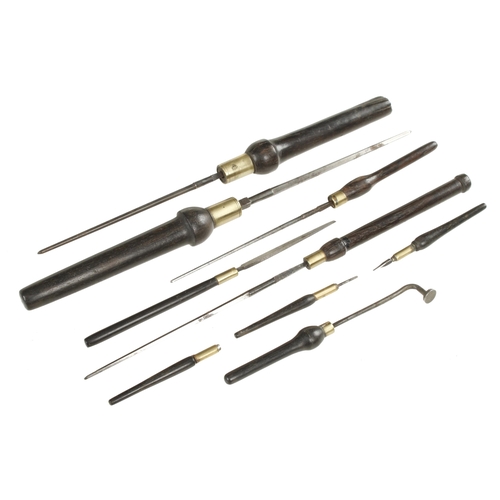 202 - Nine ebony handles reamers/drills 2 1/2