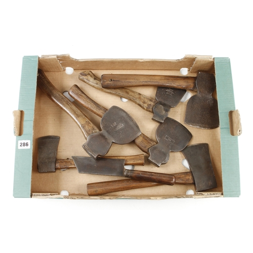 286 - Six hand axes and a stick hatchet G