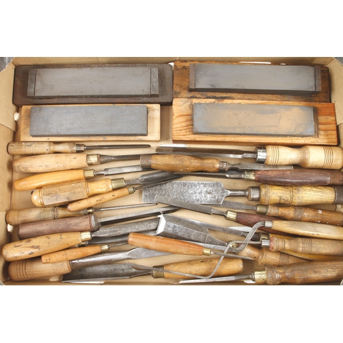 294 - 40 chisels, gouges and carving tools and 3 boxed oilstones G+