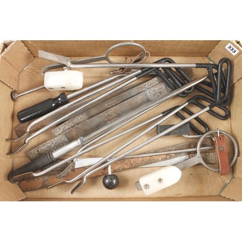 333 - A kit of equine dental equipment by World Wide Equine, Idaho, comprising huge tooth shears, 16 rasps... 