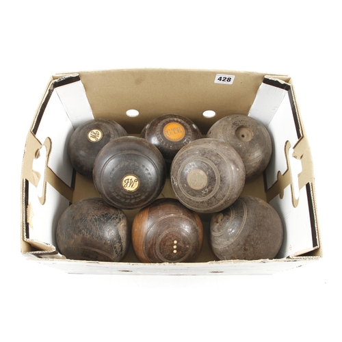 428 - Eight lignum bowls G