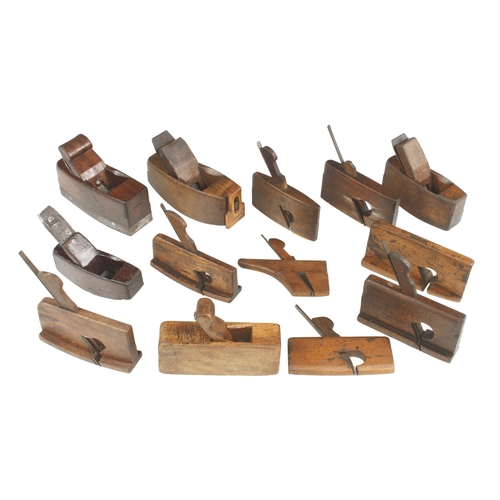 49 - A beech compass plane with boxwood toe adjustment, a steel soled smoother and 11 other coachbuilders... 