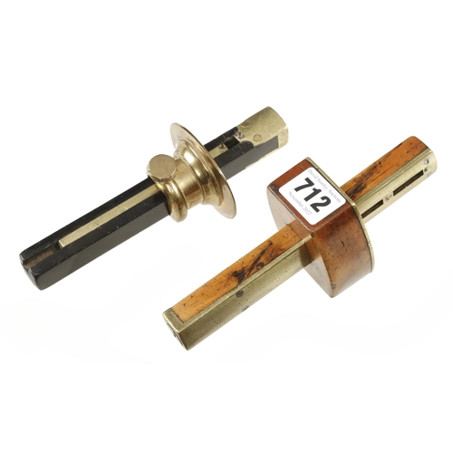 712 - An ebony mortice gauge with heavy brass stock and another in boxwood G