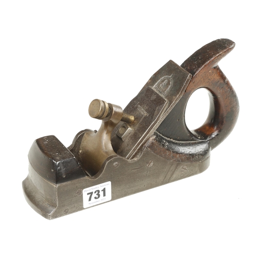 731 - A Scottish iron smoother with stepped toe and closed handle G