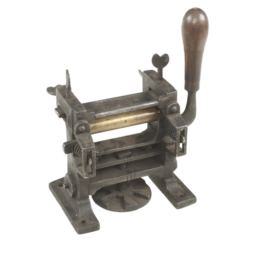 798 - A leather worker's leather splitting machine, a heel shaping tool, leather worker's hammer etc G