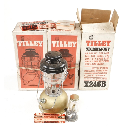 80 - Three TILLEY storm lamps in orig boxes (two unopened) with extra mantles, torches and vaporisers G