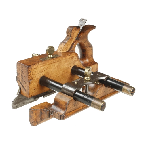 938 - A rare Mathieson No 11 handled bridle plough plane with skate front, ebony stems and steel bridle, a... 