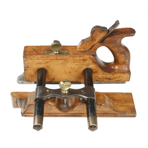 938 - A rare Mathieson No 11 handled bridle plough plane with skate front, ebony stems and steel bridle, a... 