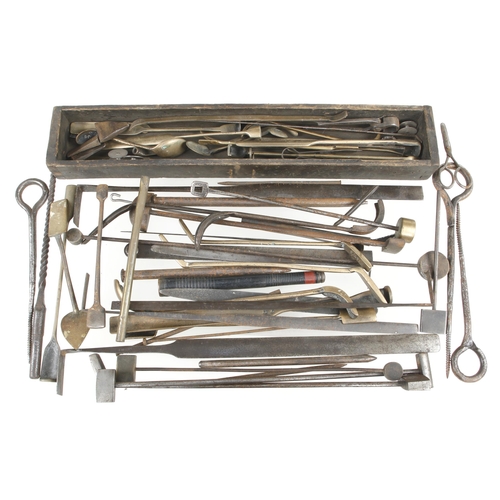 103 - A large collection of brass and steel sand moulder's tools in pine chest G+