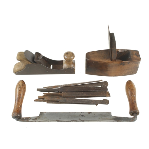 508 - A toothing plane, a German roughing plane, drawknife and 8 plough irons G