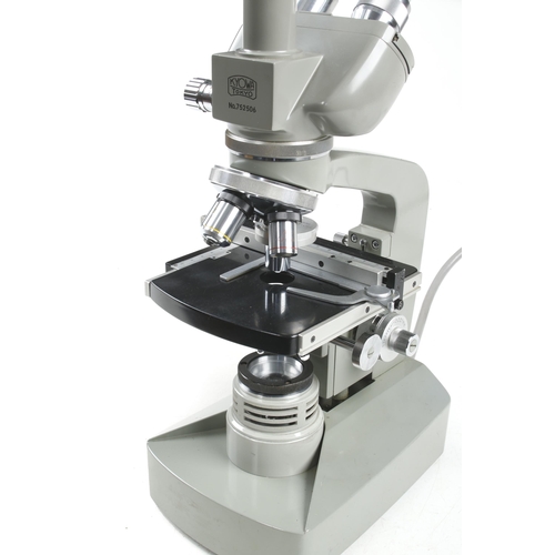 69 - A KYOWA Tokyo No 752506 binocular microscope with 3 lenses and 240 light source, in fitted box G+