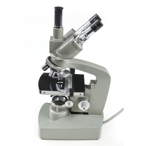 69 - A KYOWA Tokyo No 752506 binocular microscope with 3 lenses and 240 light source, in fitted box G+