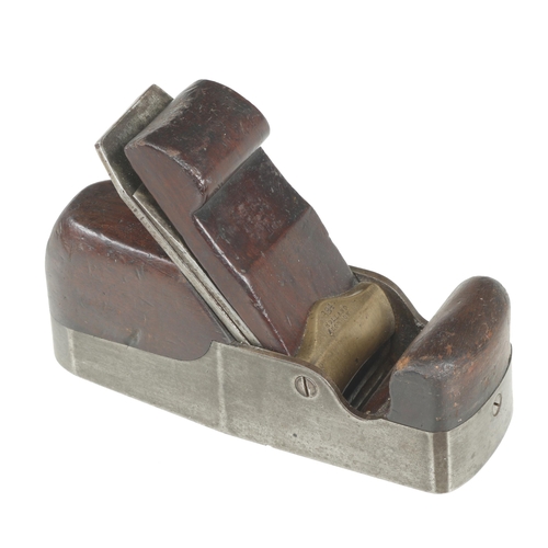 709 - An iron smoother by HOLLAND with rosewood infill and wedge G+