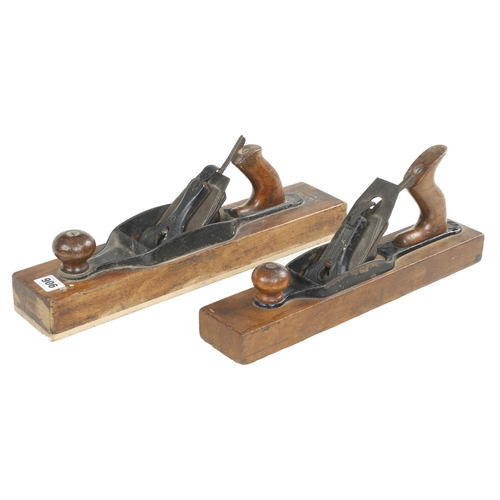 906 - A STANLEY wood bottom panel plane with added sole and another by SARGENT G