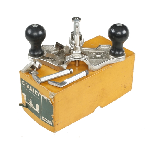 908 - An unused English STANLEY No 71 router complete with 3 cutters, depth stop and fence in orig box F