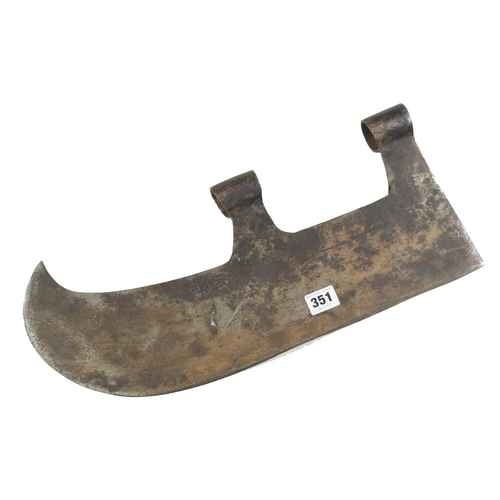 351 - An unusual axe head marked PAULAY with curved edge G+