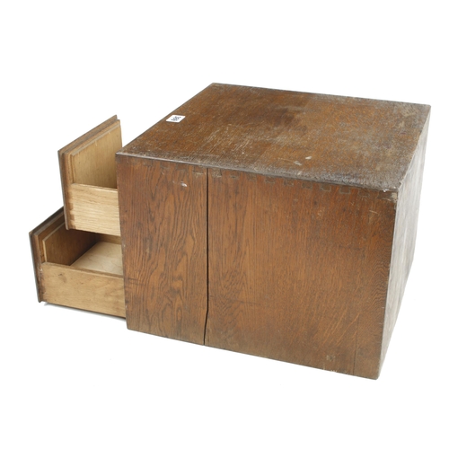 369 - A four drawer oak index card chest 16