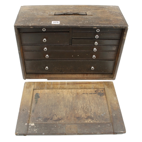 375 - An engineer's 8 drawer tool chest with various splits and cracks c/w some engineer's tools G