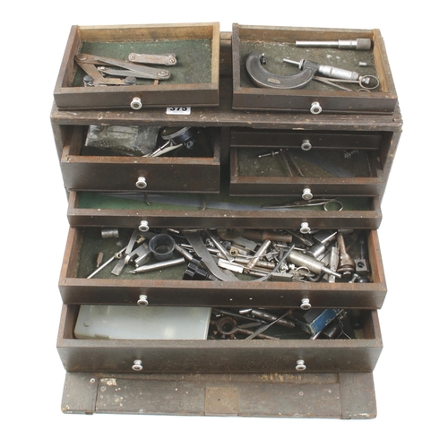 375 - An engineer's 8 drawer tool chest with various splits and cracks c/w some engineer's tools G