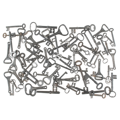 540 - A collection of 50 old keys and 20 bottle openers G