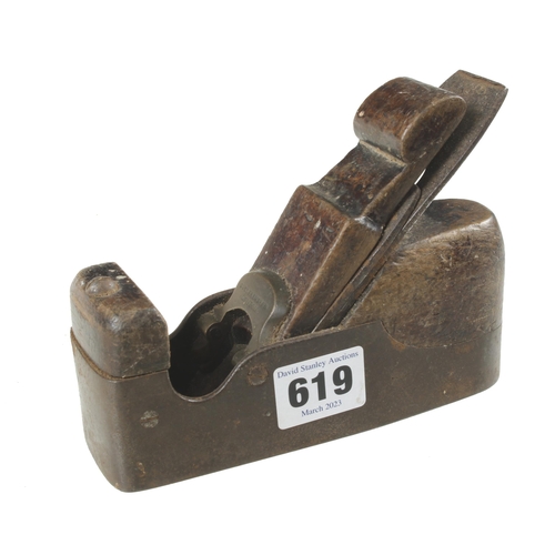 619 - A small iron smoother by G TISSINGTON London 6" x 2" with mahogany infill and wedge behind decorativ...