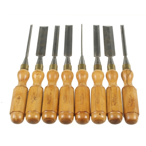 633 - A set of 8 bevel edge chisels with boxwood handles marked 