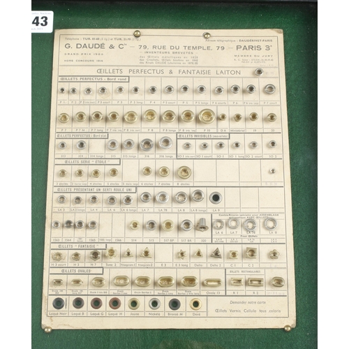 643 - A glazed display of 3 cards of rivets, collets etc by G.DAUDE Paris and another by NOMEL G