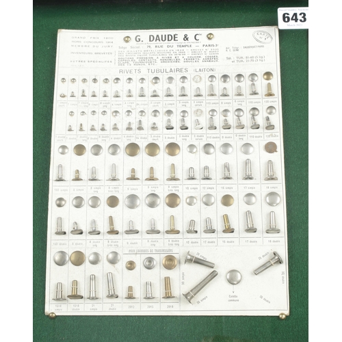 643 - A glazed display of 3 cards of rivets, collets etc by G.DAUDE Paris and another by NOMEL G