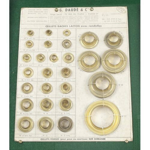 643 - A glazed display of 3 cards of rivets, collets etc by G.DAUDE Paris and another by NOMEL G