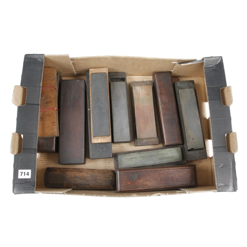 714 - 12 boxed oilstones G+