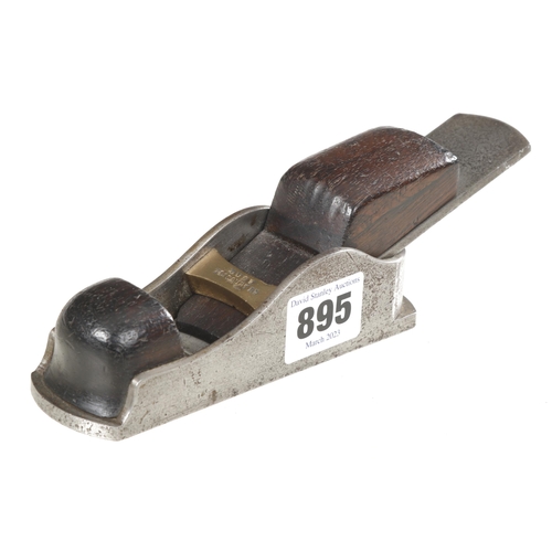 895 - An iron thumb plane stamped BUCK Tott. Ct. Rd. with rosewood infill and wedge with 1 1/4