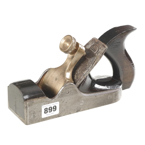 899 - A chunky iron smoother with rosewood infill and handle and double knurled brass lever screw, crack t... 