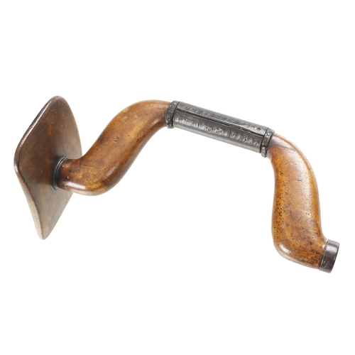 934 - An unusual hardwood brace with breast pad and leather grip G+