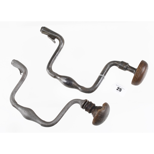 25 - A Scottish style iron brace by THOMPSON Glasgow and another similar brace G