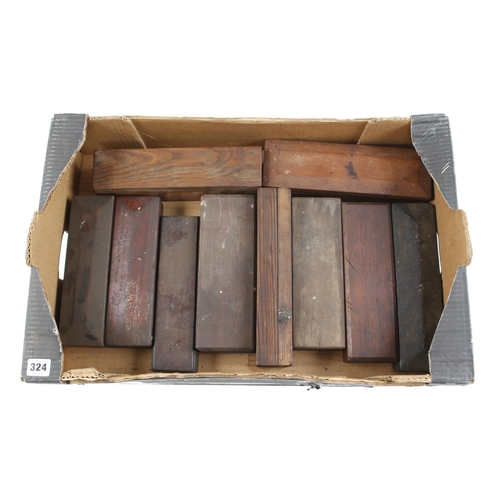 324 - Ten boxed oilstones G+