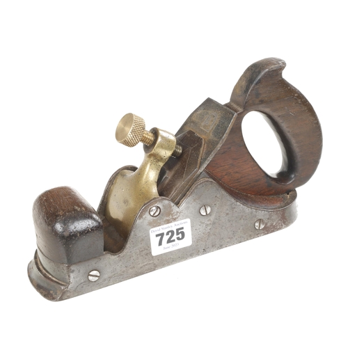 725 - A Scottish style iron smoother with stepped toe and brass lever G