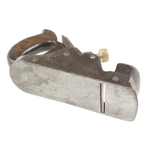 725 - A Scottish style iron smoother with stepped toe and brass lever G