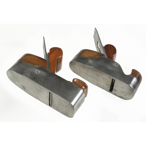 738 - Two iron smoothers with replaced wedges, one with slight hammer damage to rear, the other with brais... 