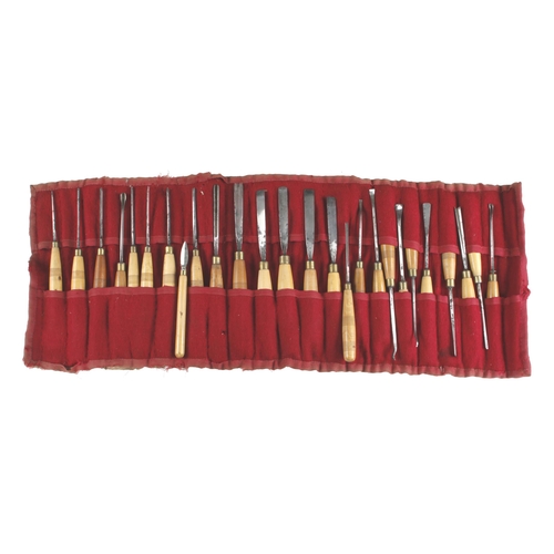 800 - A craftsman's roll of 26 carving tools mostly by ADDIS with boxwood handles G+