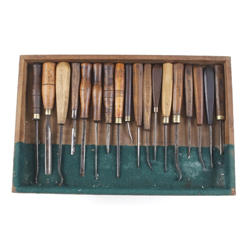 808 - A craftsman's kit of 55 carving tools and sharpening stones in 5 trays in box G+