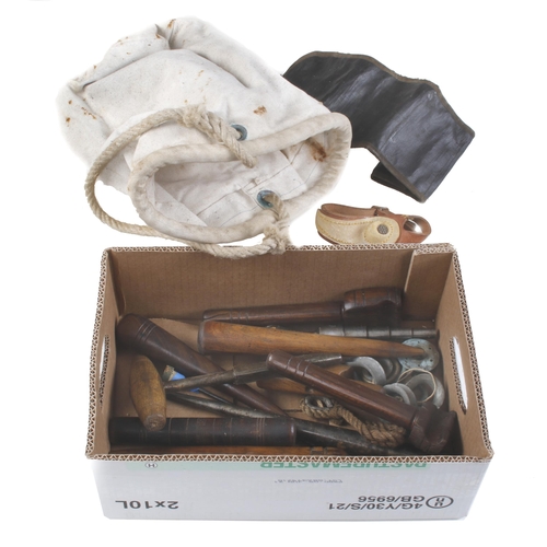 841 - A kit of sailmaker's and rigger's tools incl. fids, serving mallets, palm etc in canvas carrying bag... 