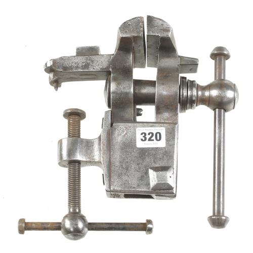 320 - An early steel bench vice with 3 1/2