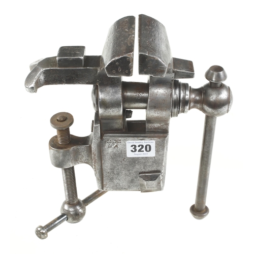 320 - An early steel bench vice with 3 1/2