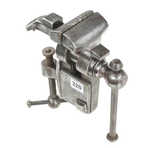 320 - An early steel bench vice with 3 1/2